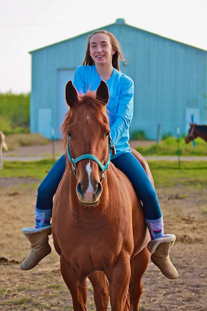 Girl Riding Horse