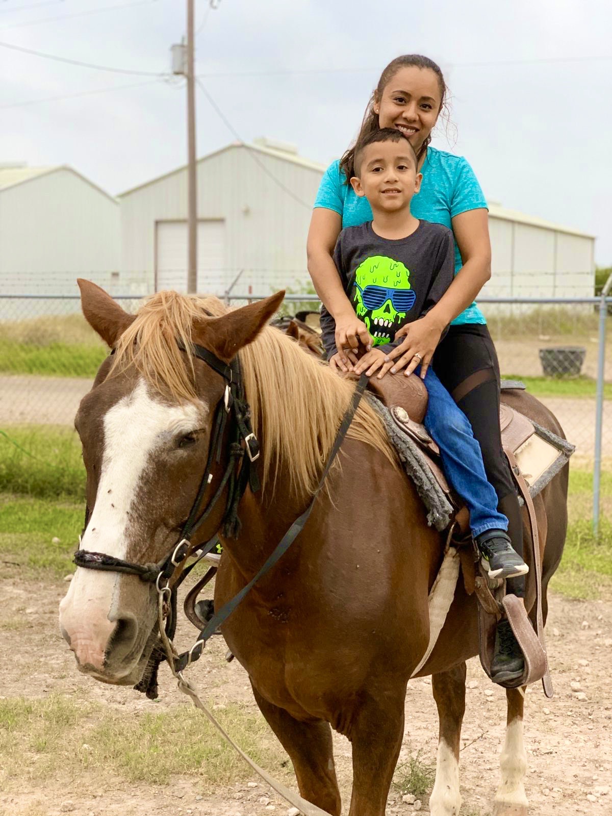 Mom and Son on a Horse